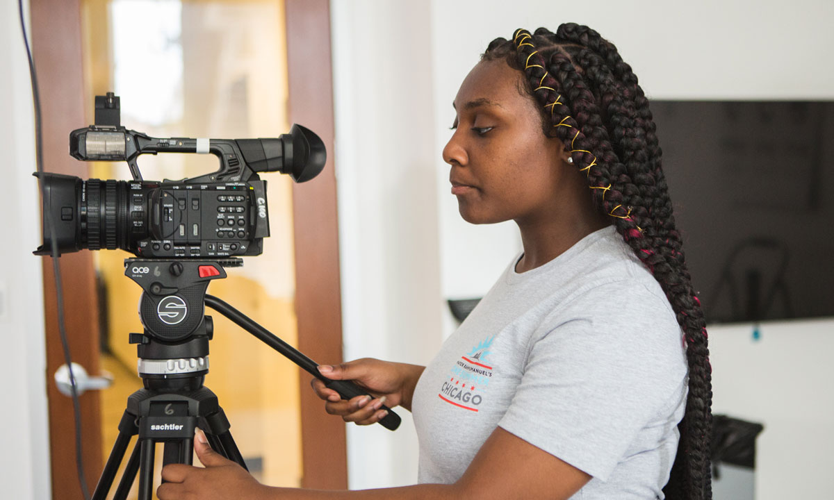 female student with camera